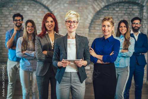 Group of happy business people and company staff in modern office, representig company.