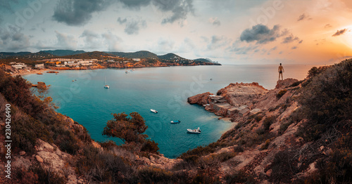 panoramic on the island of ibiza and its cliffs in an afternoon of contrasts and clouds photo