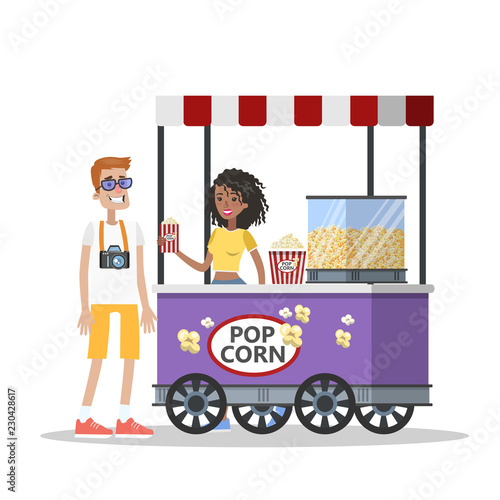 Man buy pop corn in the kiosk