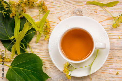 linden herbal tea on wooden table