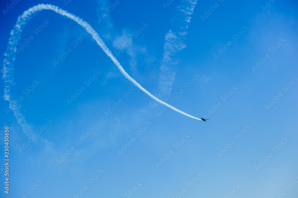 Airplanes on aerobatic performs flight and beautiful smoke trail.. Airplanes on aerobatic performs flight and beautiful smoke trail..