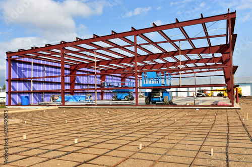 Re inforcement rod and steel framework of commercial building under construction.building under construction.