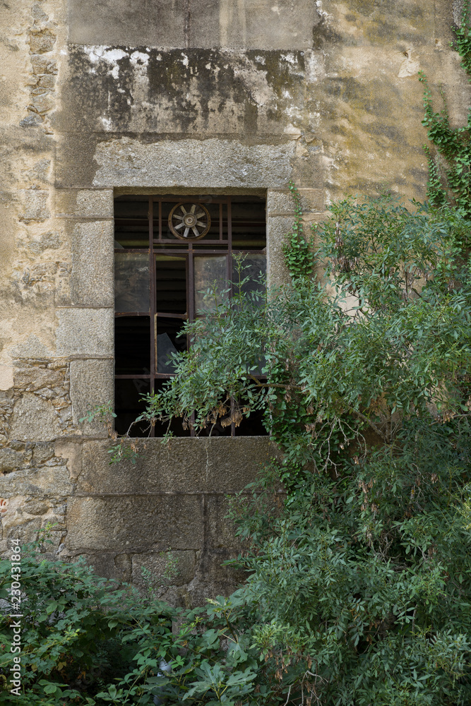 Old broken window of an abandoned factory Old broken window of an abandoned factory