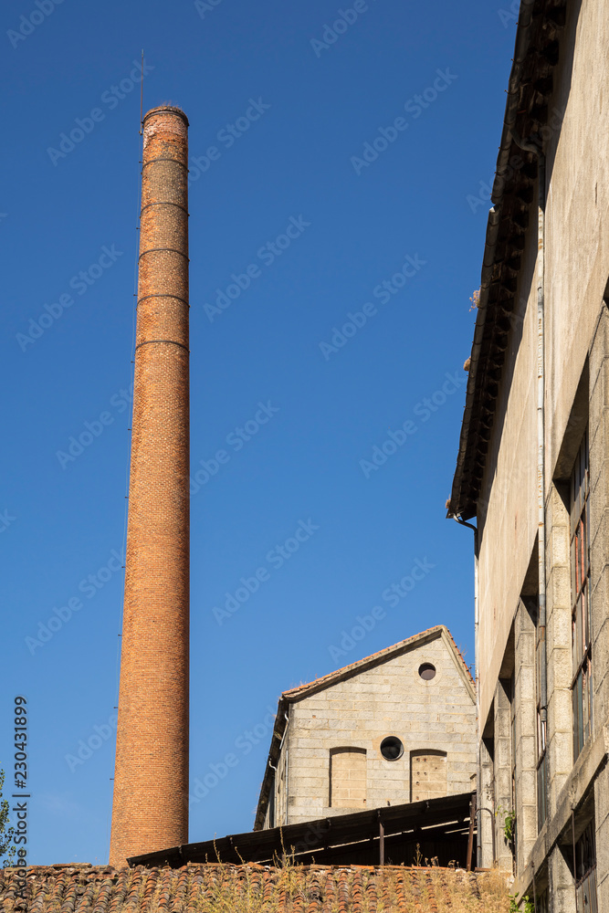 Brick chimney of an abandoned factory
