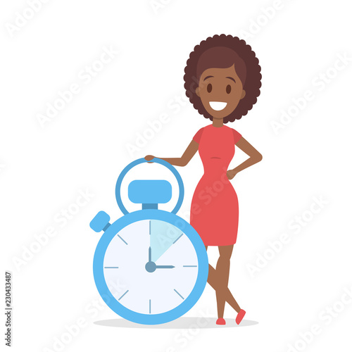 Woman standing at the stopwatch clock and smiling.