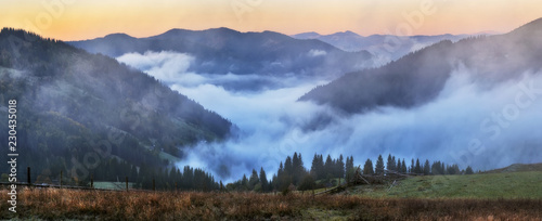 autumn sunrise in the Carpathian mountains. picturesque foggy morning © sergnester