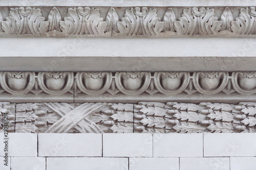 Fragment of the relief frieze with floral ornaments on top of the triumphal arch in Poklonnaya Hill