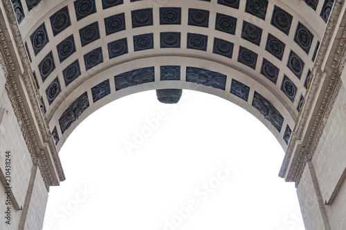 Close up view on a fragment of the triumphal arch isolated on a white background (copy space)