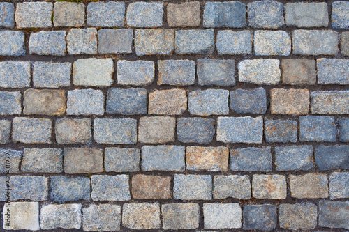 Top view on a stone roadway as texture, background