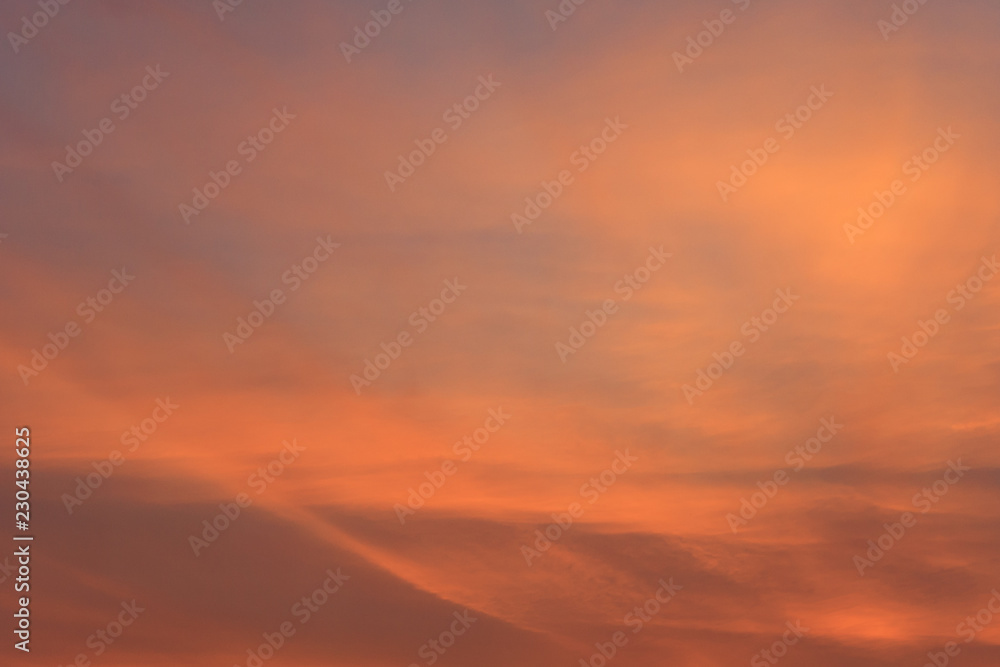 Dramatic view on a orange sky as background