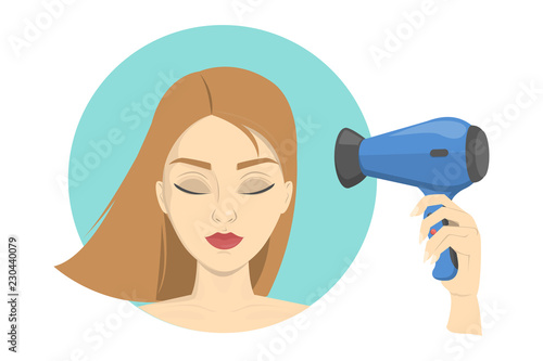 Beautiful woman dry her hair using hairdryer