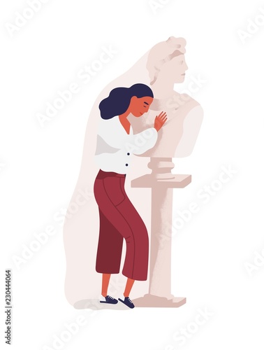 Young woman hugging statue of man