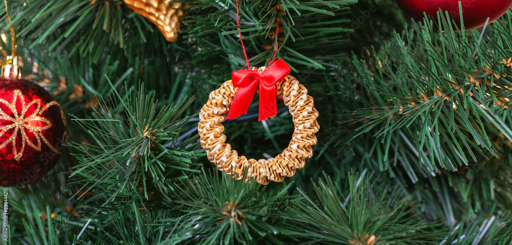 Decorations in the Scandinavian style on an artificial Christmas tree
