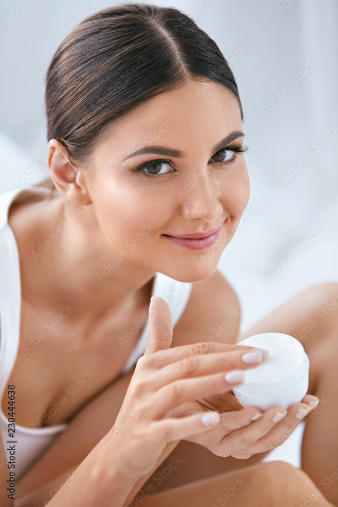 Face Skin Care. Beautiful Woman With Facial Cream. Cosmetics Face Skin Care. Beautiful Woman With Facial Cream. Cosmetics