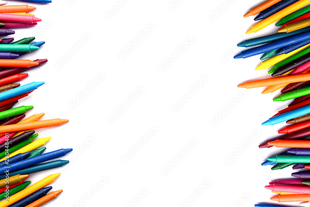 Fototapeta premium Crayons lined up isolated on white background.