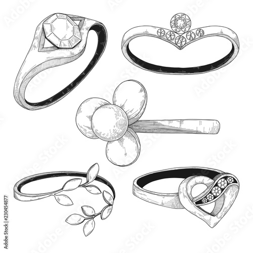 Hand drawn a set of different jewelry rings. Vector illustration of a sketch style.