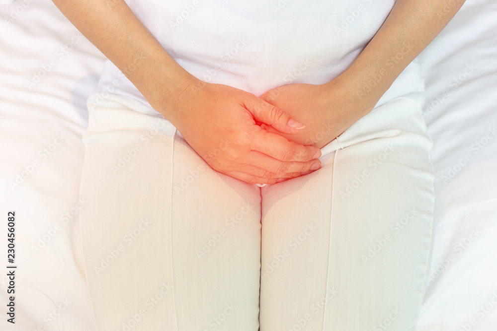 woman have bladder pain lying on bed in bedroom after wake up feeling so illness,Healthcare concept woman have bladder pain lying on bed in bedroom after wake up feeling so illness,Healthcare concept