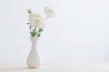 chrysanthemum in white vase