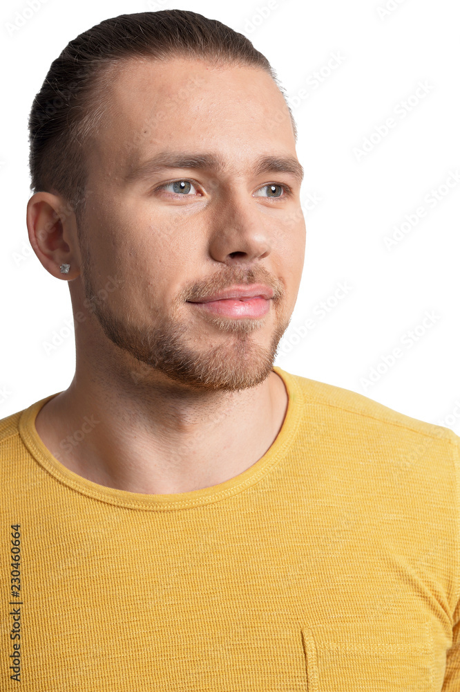 Obraz premium Portrait of handsome young man on white background