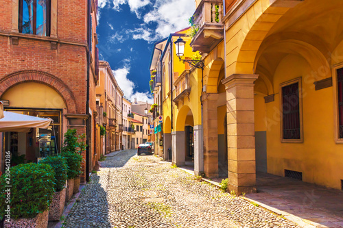 Fototapeta Naklejka Na Ścianę i Meble -  Picturesque buildings on one of the narrow medieval streets in Padua, Italy.