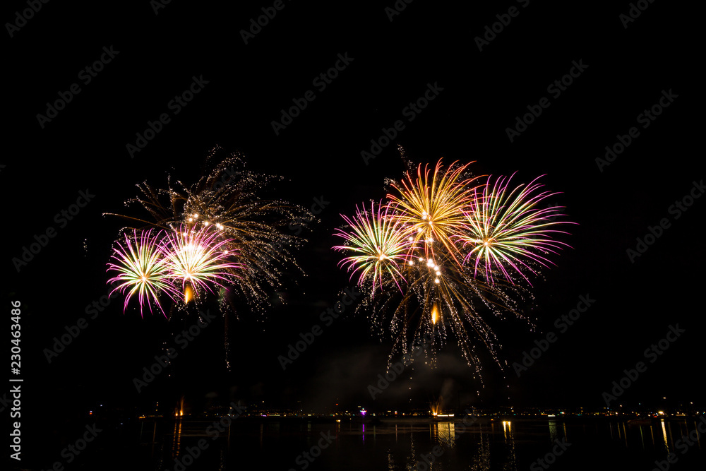 Germany, Magnificent fireworks show of rocket explosion in the night at Friedrichshafen Germany, Magnificent fireworks show of rocket explosion in the night at Friedrichshafen