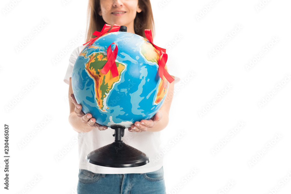 cropped image of woman holding globe with red ribbons isolated on white, world aids day concept cropped image of woman holding globe with red ribbons isolated on white, world aids day concept