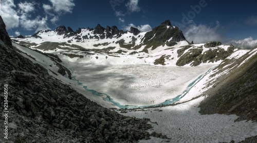 Wildsee during Spring thaw; lake on the Pizol 5-lakes walk, Swiss Alps