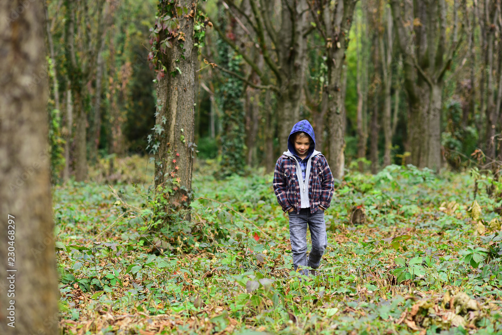 Homeless and abandoned. Homeless child walk in woods. Homeless boy without parental care outdoor. Street child has to seek homeless shelter and food. Homelessness among children is a serious issue Homeless and abandoned. Homeless child walk in woods. Homeless boy without parental care outdoor. Street child has to seek homeless shelter and food. Homelessness among children is a serious issue