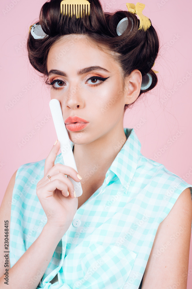 retro woman with fashion makeup and hair. vintage housewife woman make  manicure. happy girl grooming in morning. beauty salon and hairdresser. Pin  up girl. Feeling flirty. Gorgeous and beautiful foto de Stock