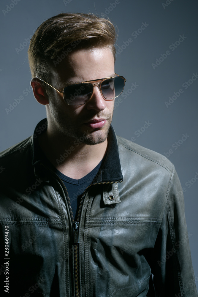 Exciting style. Handsome man wear eye glasses. Man of fashion. Fashion  model in trendy sun glasses. Fashion eyewear. Reflecting the masculine  connotations of the typical man Stock Photo