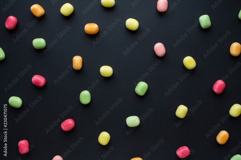 colorful candy on black background colorful candy on black background