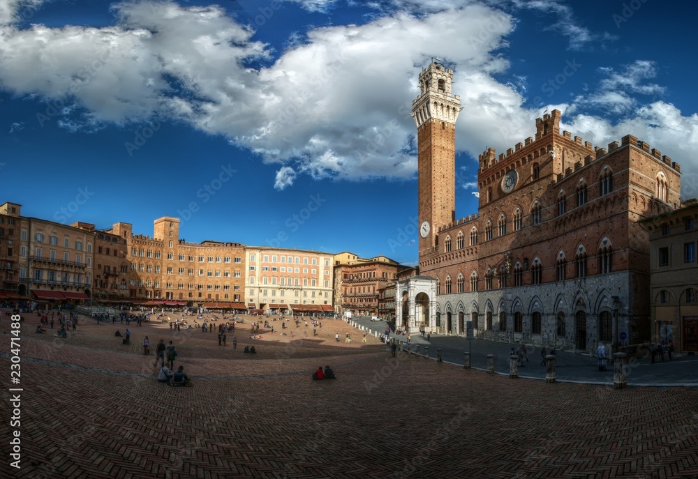 Piazza del Campo in Siena, Tuscany, showing the Palazzo Pubblico and the Torre del Mangia tower