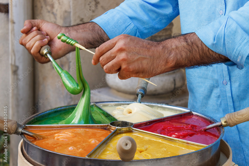 Obraz premium Preparation of multi-colored caramel.
