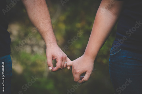Portrait of a beautiful happy in love couple holding hands © Sus