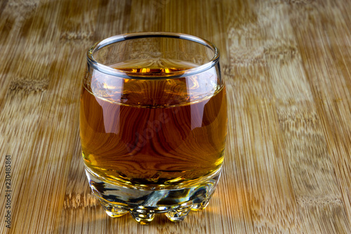 Glass of Scotch Whisky on a Wooden Surface