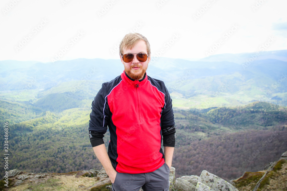 The guy on top of the mountain. Traveler Secret mountains. Ukrainian Carpathian Mountains.