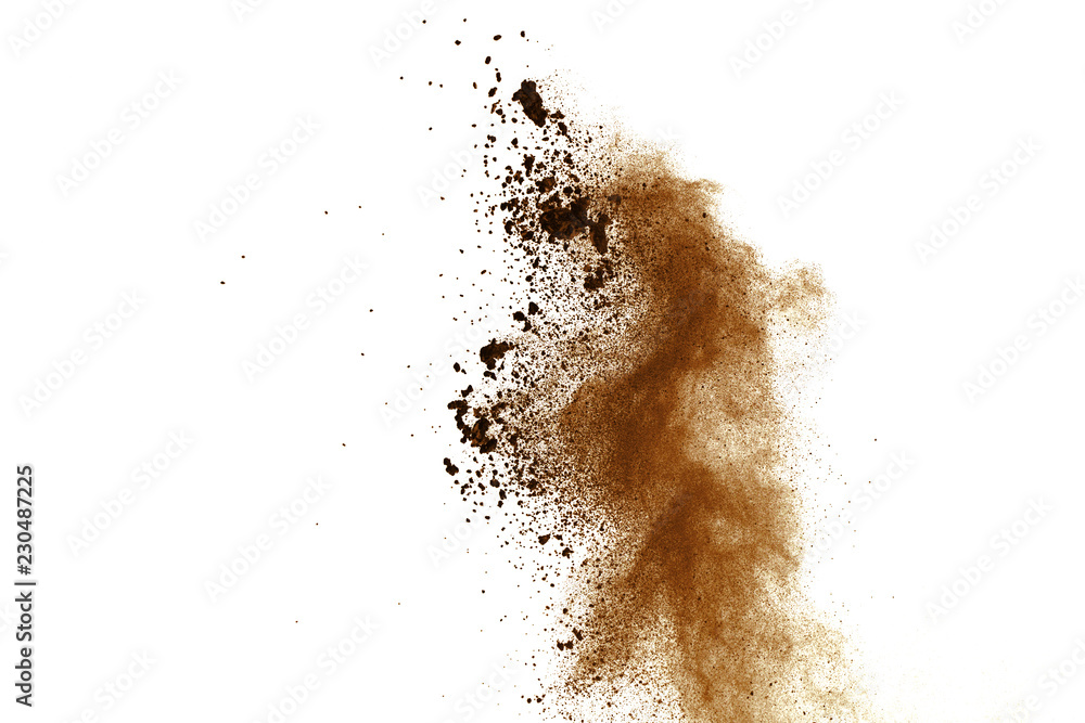 Brown powder explosion on white background. Dry soil splatted isolated. Paint Holi.