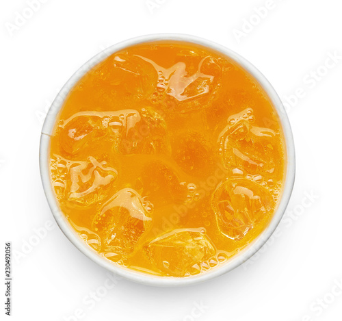 Orange soft drink with ice cubes in take away plastic cup top view isolated on white background