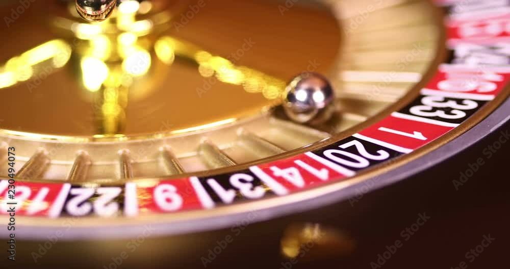 Roulette wheel running in a casino Roulette wheel running in a casino