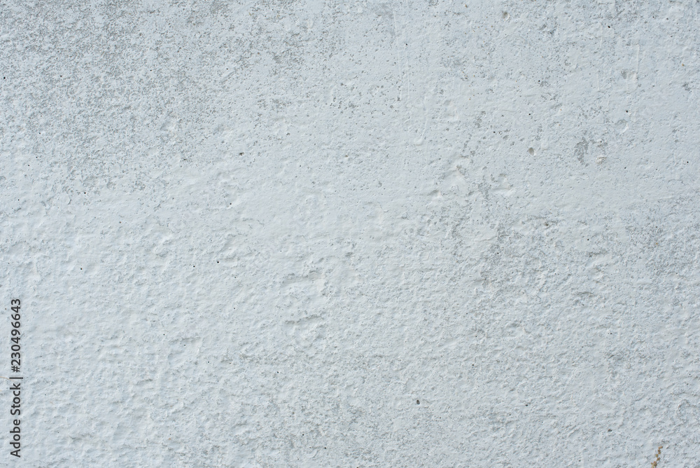 Fototapeta premium Wall fragment with scratches and cracks. It can be used as a background