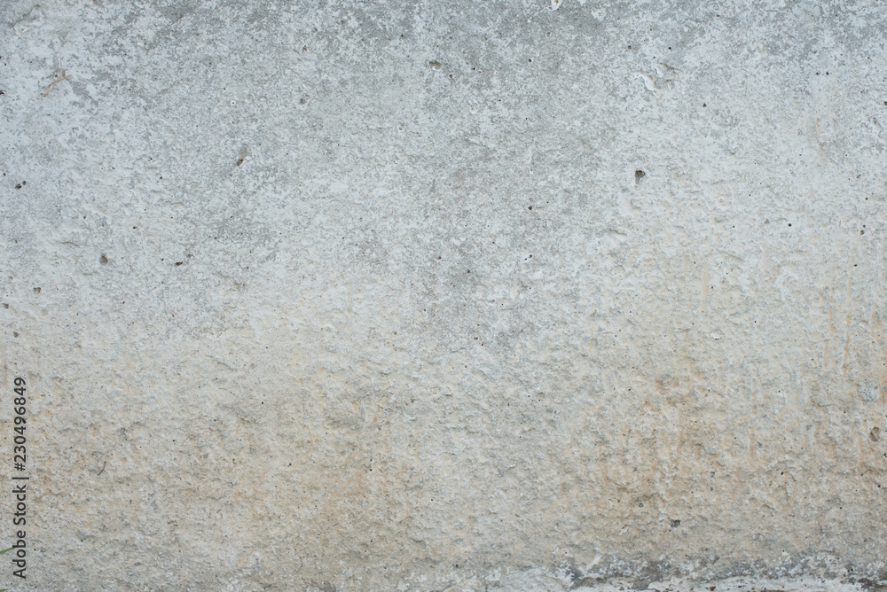 Fototapeta premium Wall fragment with scratches and cracks. It can be used as a background