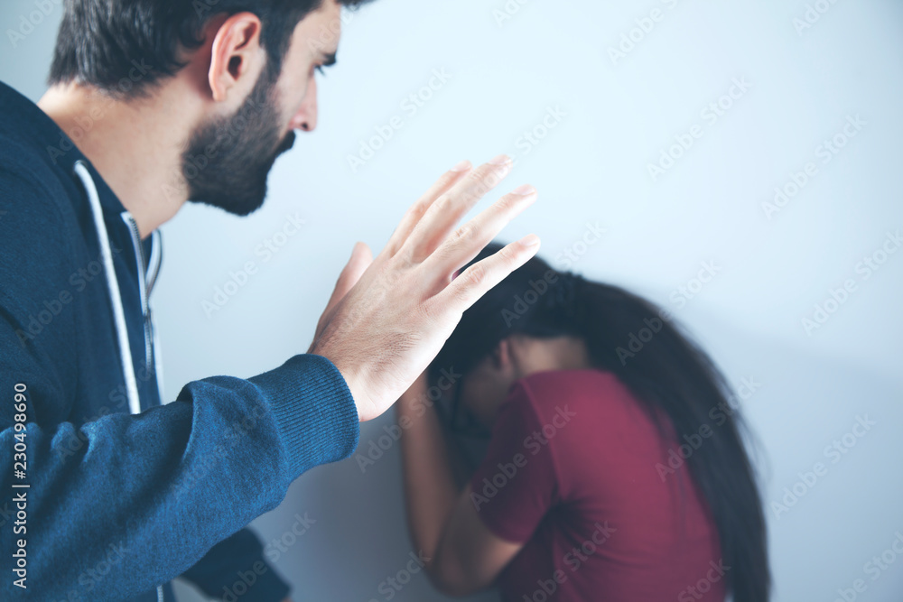 man beating helpless woman at home man beating helpless woman at home