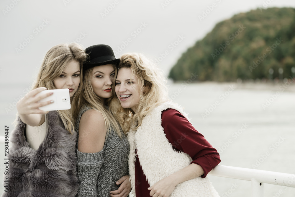 Three women taking selfie outdoor Three women taking selfie outdoor