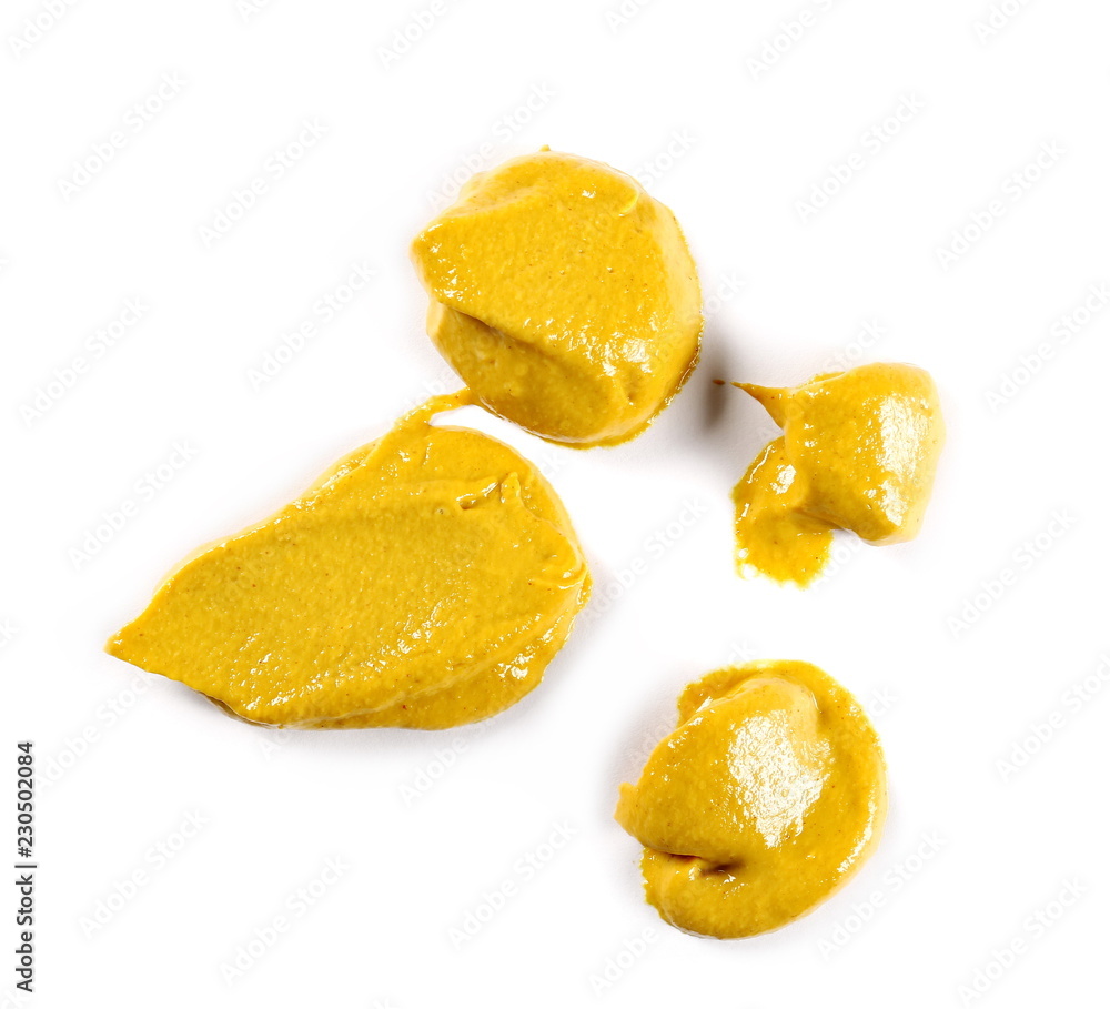 Yellow mustard sauce, spread isolated on white background, top view