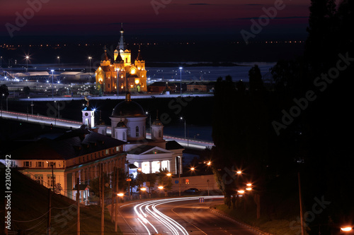Scenic view of Chapel of St Alexius, NIzhny Novgorod Theological Seminary and Alexander Nevsky Cathedral at night. Long exposure photo photo