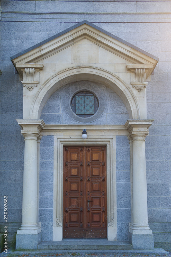 Fototapeta premium entrance or portal to a church with highlights
