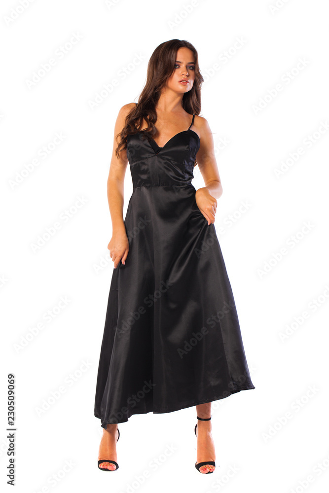 Fototapeta premium Full body, Young beautiful brunette woman in long black dress