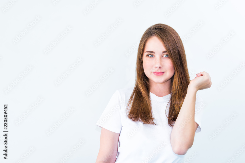 Close up portrait of Happy brunette caucasian smiling young woman looking at camera and posing isolated over white background. Body positive, self confidence, self love concept. Copy space. Close up portrait of Happy brunette caucasian smiling young woman looking at camera and posing isolated over white background. Body positive, self confidence, self love concept. Copy space.