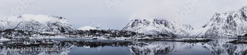 Landscape with beautiful winter lake and snowy mountains at Lofoten Islands in Northern Norway. Panoramic view