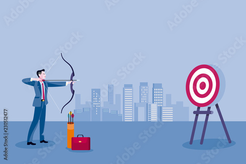 Business man aiming at the target